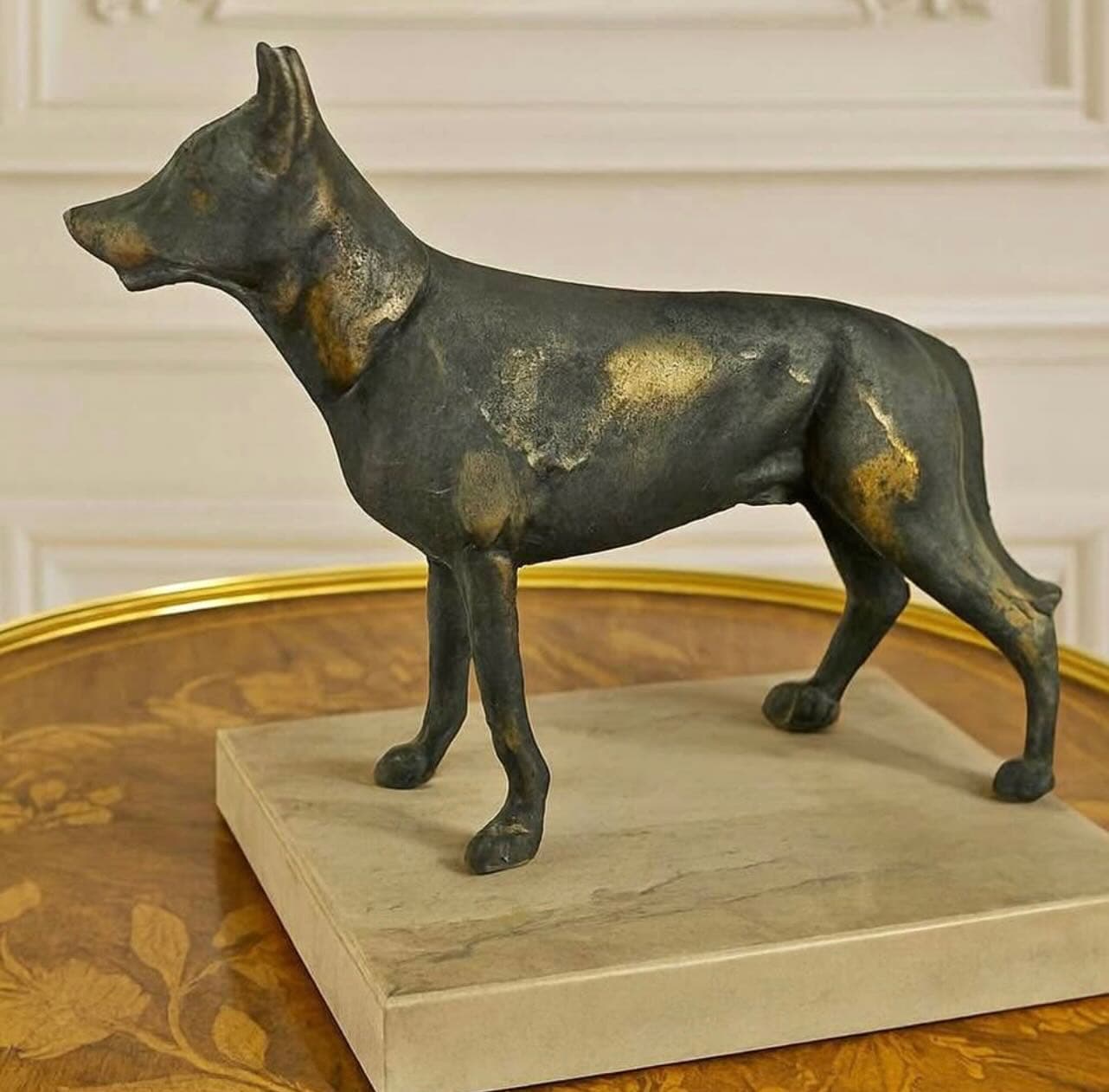 Bronze dog sculpture
