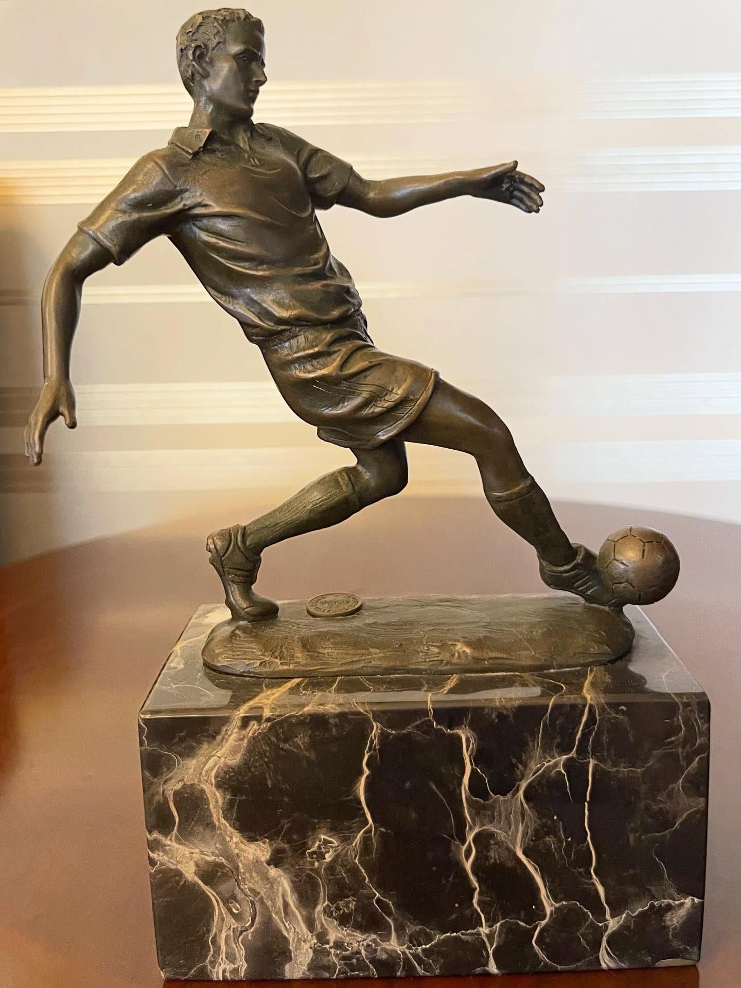 Bronze sports figurine